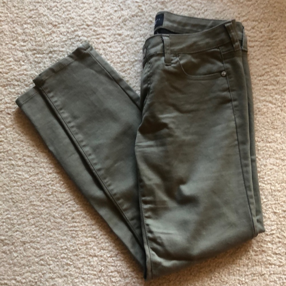 Olive green skinny jeans.